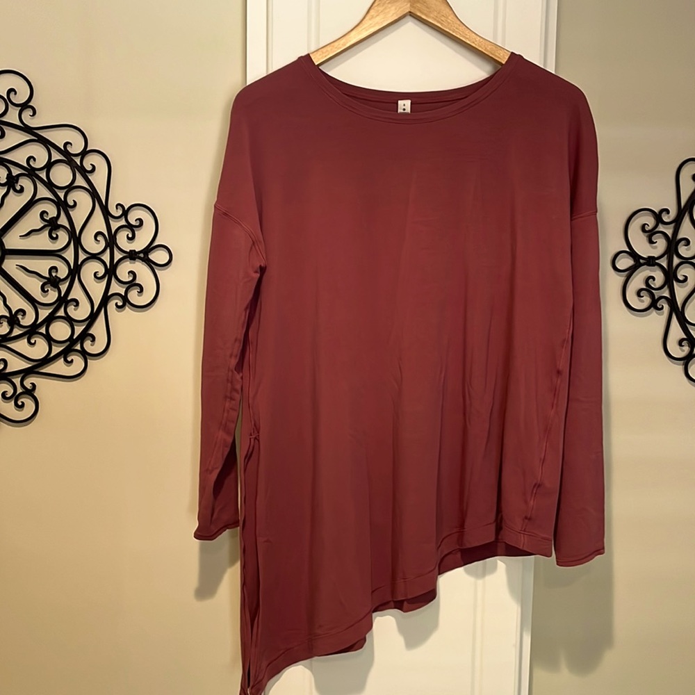 Lululemon top mauve in color.  Gently used condition.